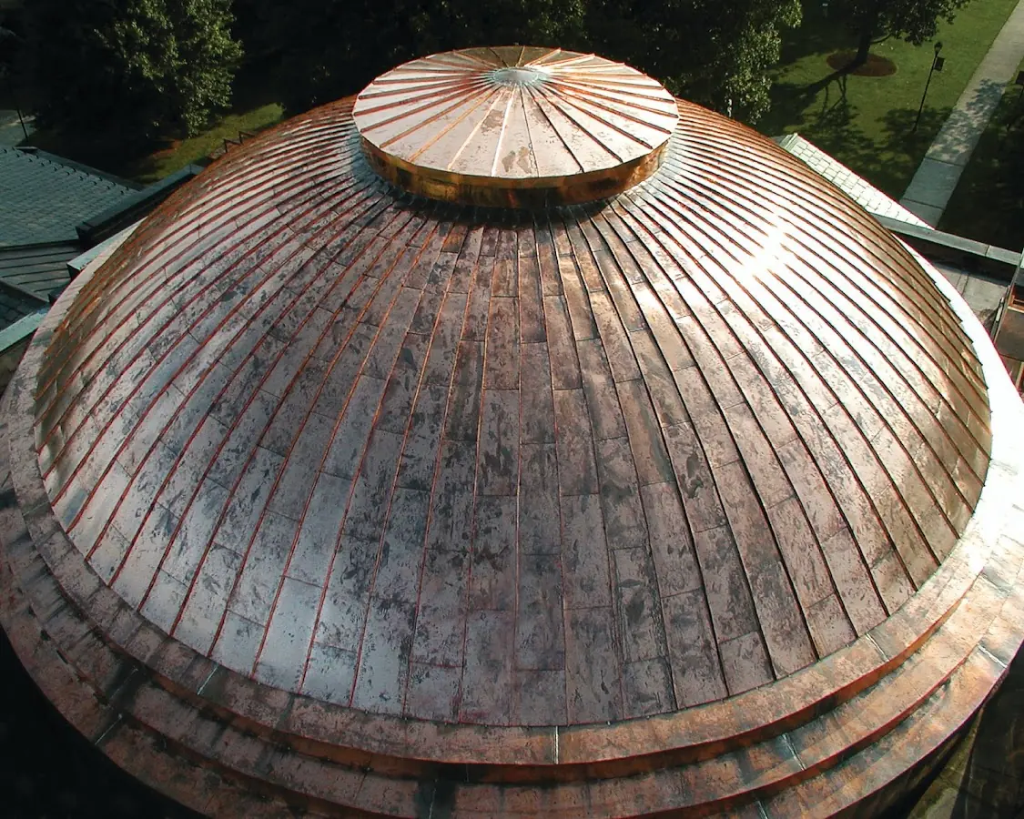 Craftsman Roofing crew installing a new roof in Newtonville